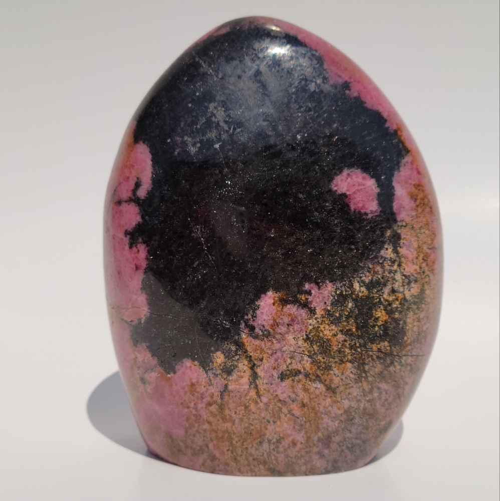 Rhodonite freeform with heart palmstone